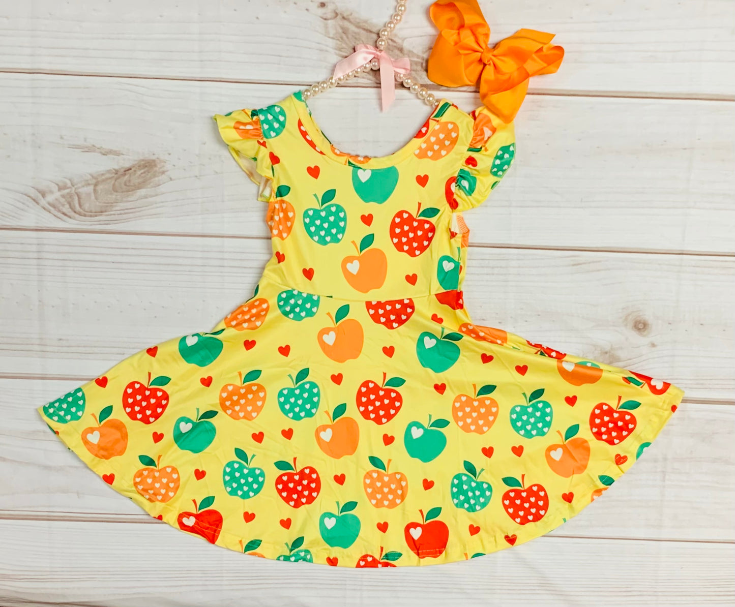 Milk Silk Back to School Yellow Apple Twirl Sleeve Dress, Girls Red, Green Apples, Bus, Pencil Elementary, Preschool Flutter Sleeve Pictures Comfortable, silky smooth material, no wrinkles, machine wash, easy to wear, adorable prints for happy girls!